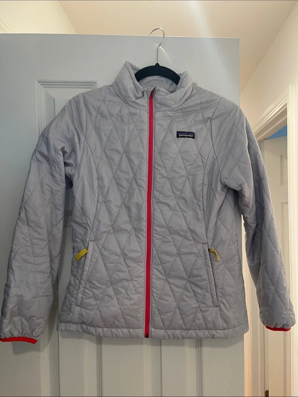 Patagonia Light Gray Quilted Girls' Jacket with Pink Zipper and Yellow Accents